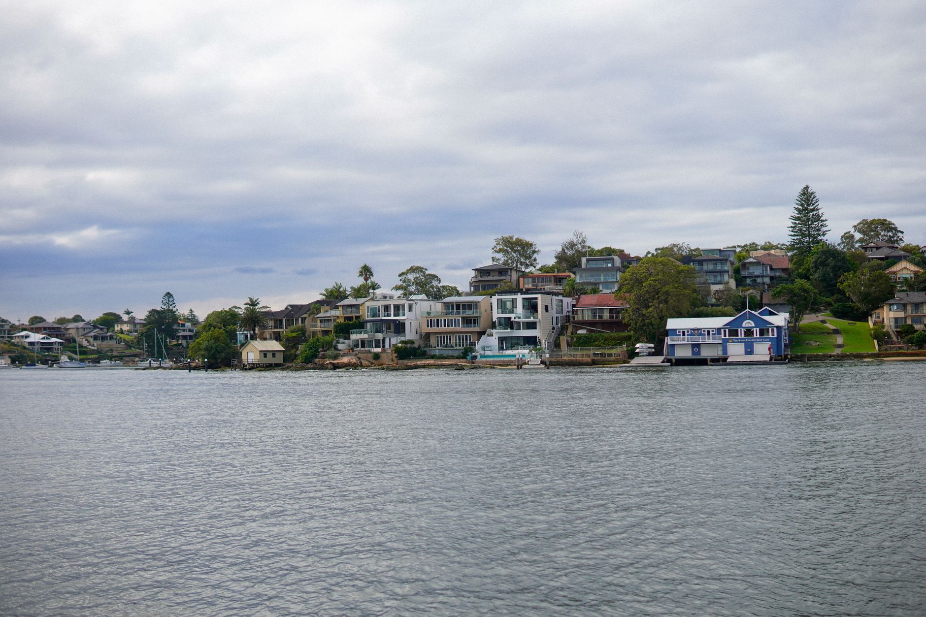 Seaside homes along a calm coastline